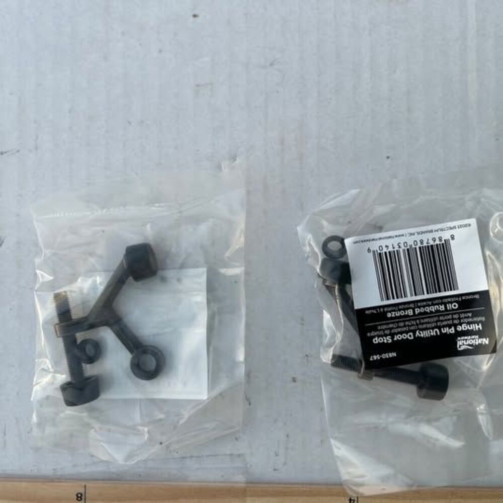 National Hardware case of 40 oiled bronze hinge pin door stop